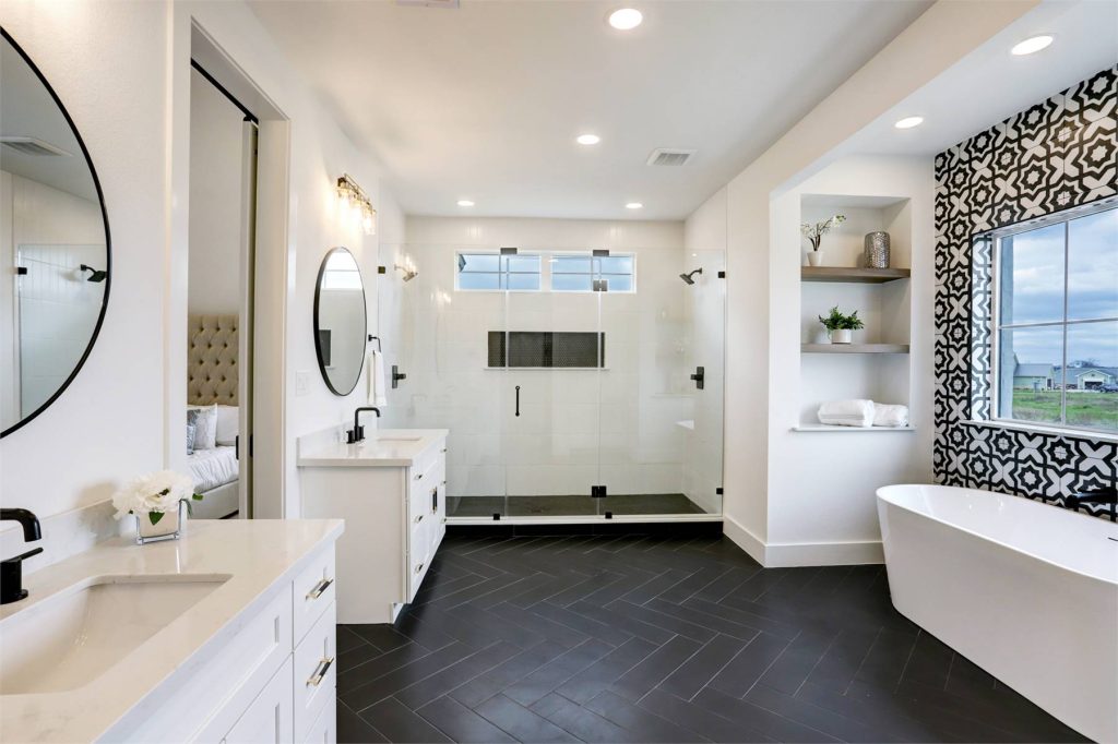 a luxe primary suite bathroom