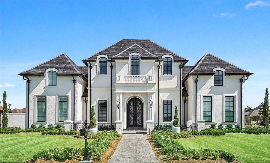 A Grand Two-Story European Home with Four Split Bedrooms, Sunny Living and Dining, and More